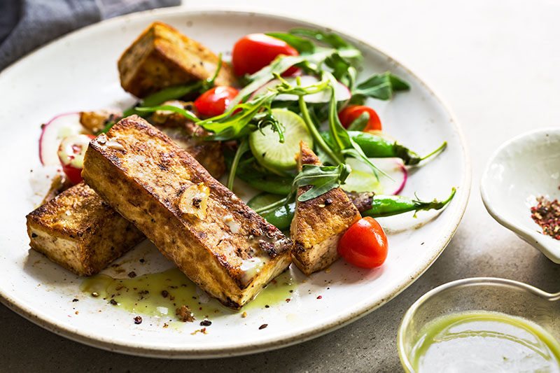 Tofu steak with Snow Peas and Rocket Salad image