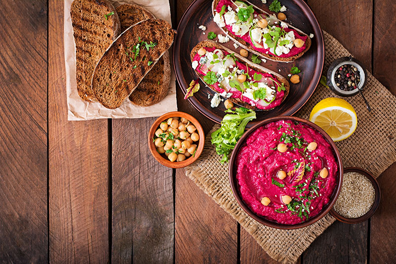 Vegan Sandwiches with Beetroot Hummus, Cucumber, and Vegan Cheese Image